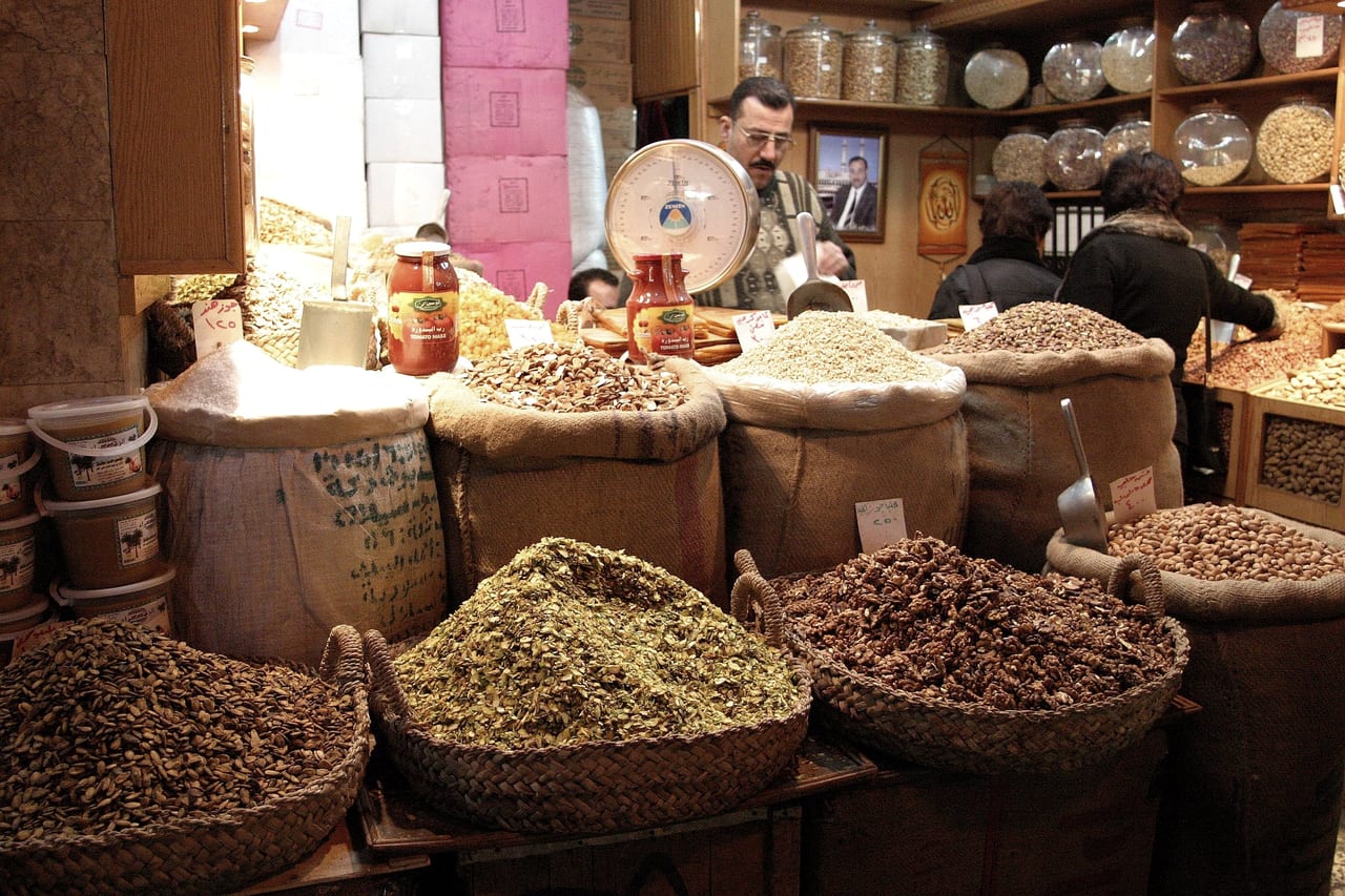 Sacks of spices and nuts in a market shop.